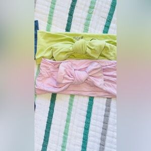 Kyte baby bows (pistachio and mauve)